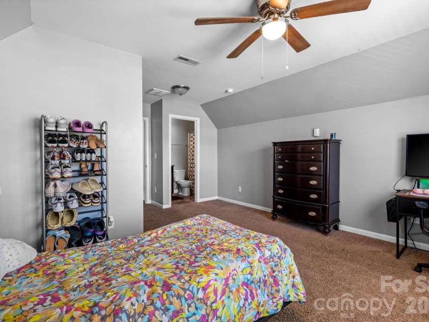 2408 Winding River Drive, Charlotte, NC 28214.  MLS# CAR4357209, YatesRealty ID 16865. Private secondary bedroom with ample space and storage
