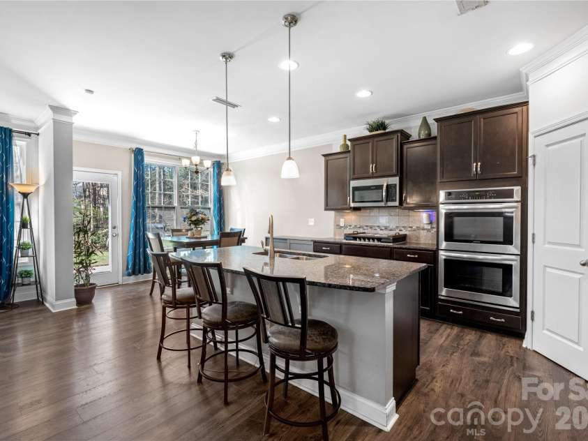 2408 Winding River Drive, Charlotte, NC 28214.  MLS# CAR4357209, YatesRealty ID 16865. Spacious kitchen with large island and open layout