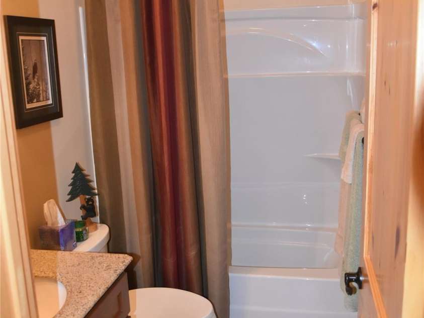 80 Grandview Loop, Nebo, NC 28761.  MLS# CAR4317495, YatesRealty ID 16868. Guest Bathroom main level.