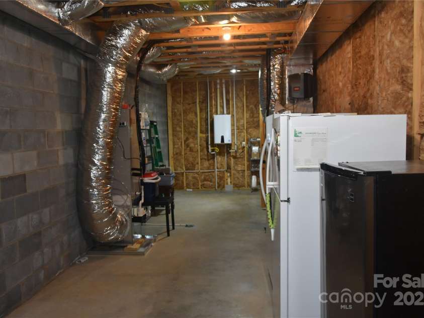 80 Grandview Loop, Nebo, NC 28761.  MLS# CAR4317495, YatesRealty ID 16868. Sizable storage area with easy access to hvac, filtration and home systems.