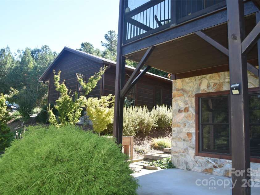 80 Grandview Loop, Nebo, NC 28761.  MLS# CAR4317495, YatesRealty ID 16868. View of patio and side walk access.