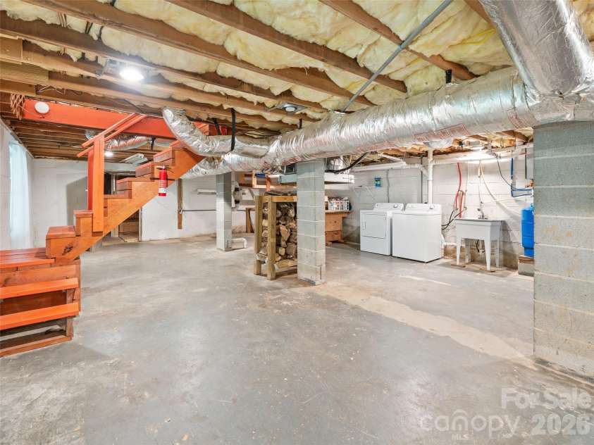 125 HEARTLAND Lane, Burnsville, NC 28714.  MLS# CAR4273356, YatesRealty ID 16873. Basement expansion area.