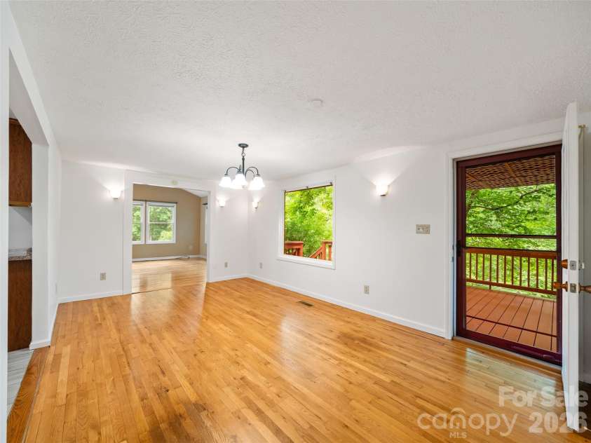 125 HEARTLAND Lane, Burnsville, NC 28714.  MLS# CAR4273356, YatesRealty ID 16873. Great flow for entertaining!