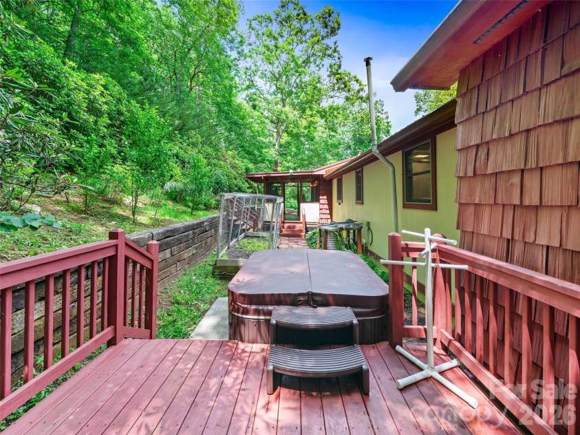 125 HEARTLAND Lane, Burnsville, NC 28714.  MLS# CAR4273356, YatesRealty ID 16873. Hot Tub with private deck.