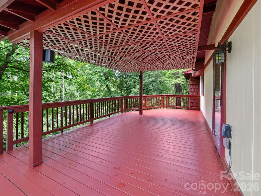 125 HEARTLAND Lane, Burnsville, NC 28714.  MLS# CAR4273356, YatesRealty ID 16873. Large entertaining deck.