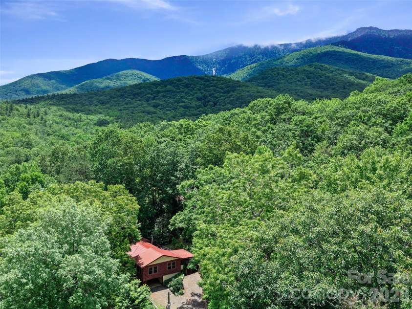 125 HEARTLAND Lane, Burnsville, NC 28714.  MLS# CAR4273356, YatesRealty ID 16873. Mountain living on dead end, private rd.