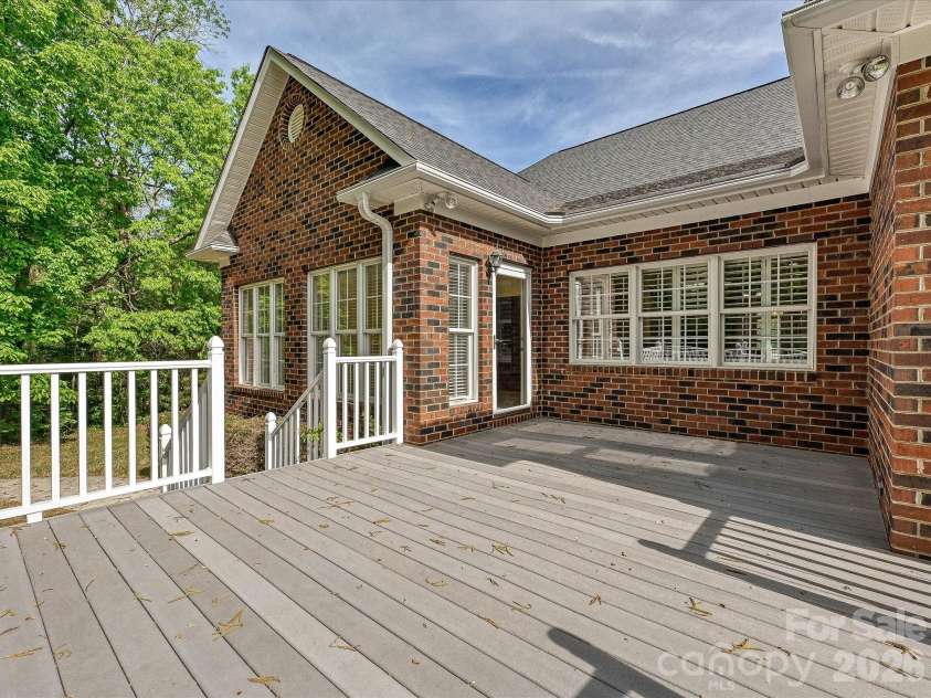 10896 Pioneer Mill Road, Concord, NC 28025.  MLS# CAR4369471, YatesRealty ID 16875. Large sunny deck with private views