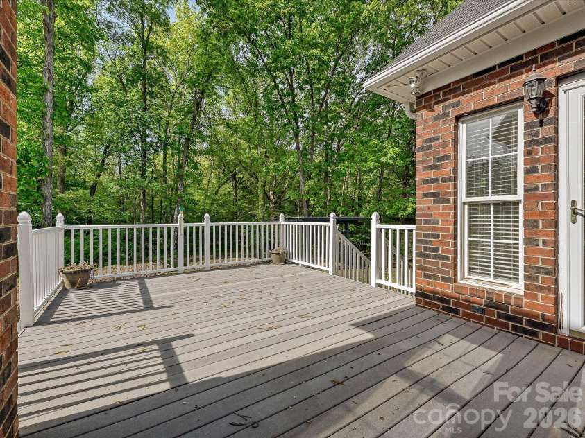 10896 Pioneer Mill Road, Concord, NC 28025.  MLS# CAR4369471, YatesRealty ID 16875. Rear deck, Trex material
