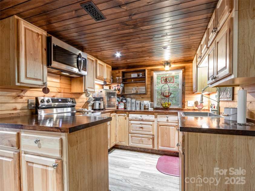 12982 US HWY 19W None, Burnsville, NC 28714.  MLS# CAR4234088, YatesRealty ID 16876. Remodeled kitchen