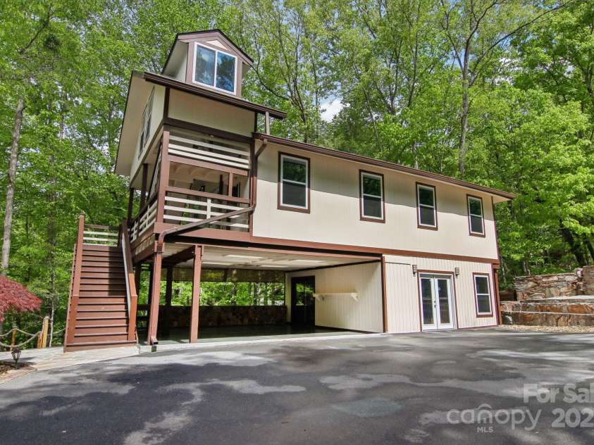 295 Dills Road, Bryson City, NC 28713.  MLS# CAR4280910, YatesRealty ID 16878. Detached Gym Building with a double Carport Gym, Pool Table, Living Area, Storage & More!