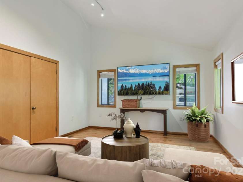 295 Dills Road, Bryson City, NC 28713.  MLS# CAR4280910, YatesRealty ID 16878. Virtually staged media room on main living floor