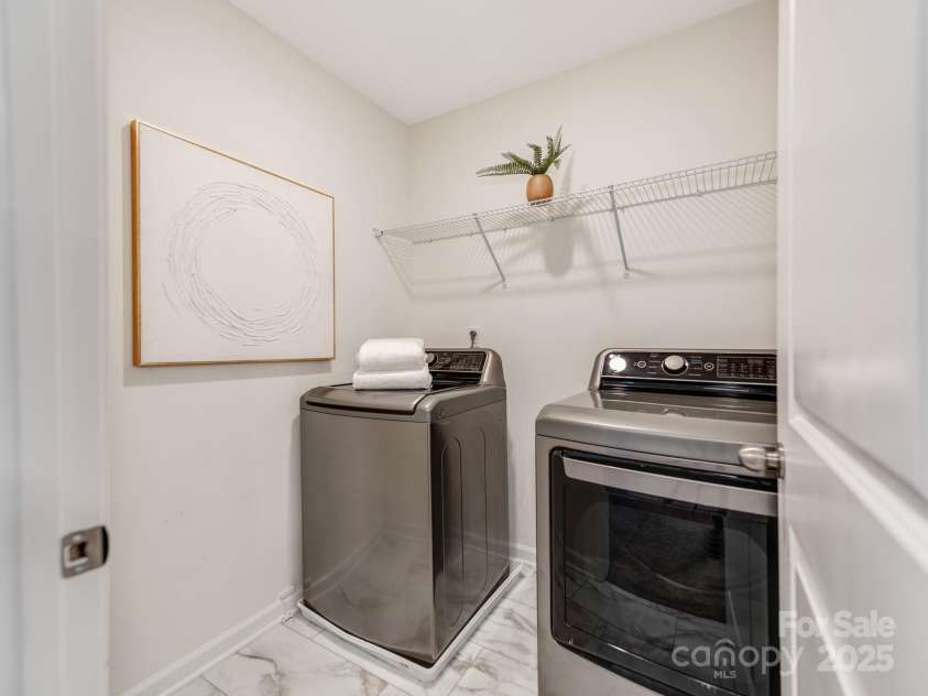 222 Harpers Run Lane, Matthews, NC 28104.  MLS# CAR4287195, YatesRealty ID 16883. Upper laundry room