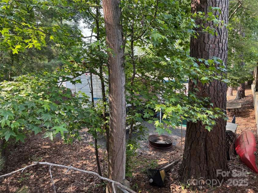 103 Powder Horn Trail, Mount Gilead, NC 27306.  MLS# CAR4266296, YatesRealty ID 16884. Back of property