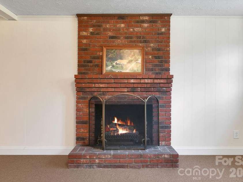 1482 Island Ford Road, Brevard, NC 28712.  MLS# CAR4366891, YatesRealty ID 16887. Beautiful Fireplace