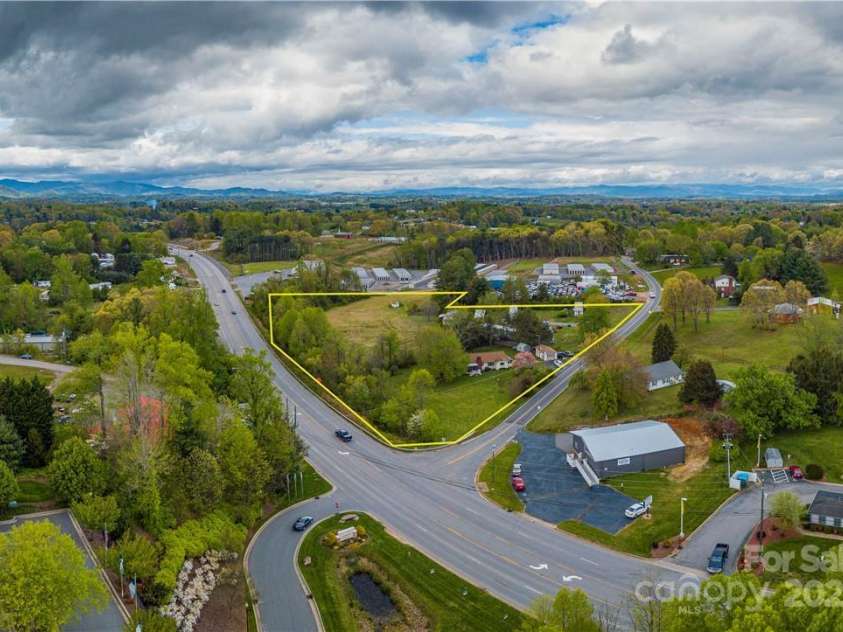 0000 New Leicester Highway, Asheville, NC 28806.  MLS# CAR3603722, YatesRealty ID 1689. Over 500' road frontage on two roads