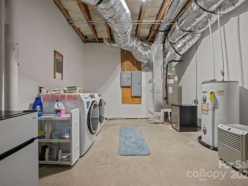 23 Jay Foster Way, Saluda, NC 28773.  MLS# CAR4278065, YatesRealty ID 1689. Laundry Area in Basement.  Washer/Dryer convey!