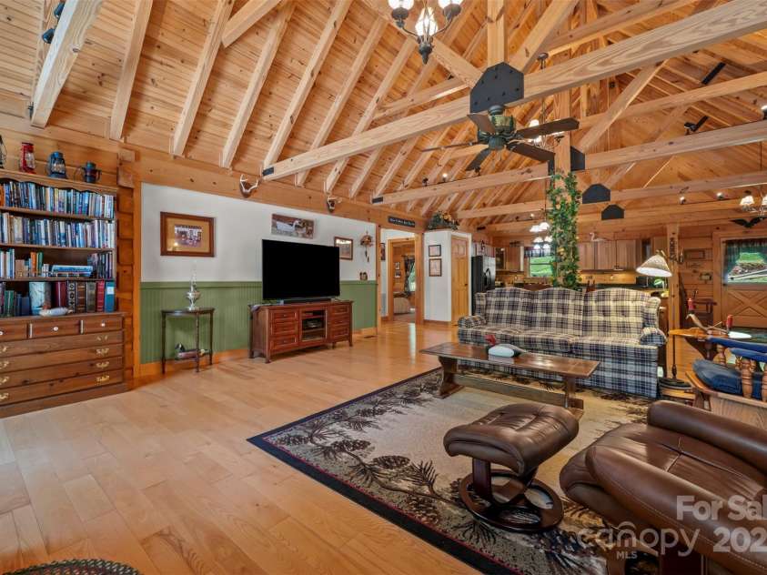 23 Jay Foster Way, Saluda, NC 28773.  MLS# CAR4278065, YatesRealty ID 1689. Open Floor Plan flows from living to dining and kitchen.  Great for gathering with family and friends!