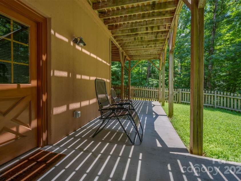 23 Jay Foster Way, Saluda, NC 28773.  MLS# CAR4278065, YatesRealty ID 1689. View showing outside entry into basement.