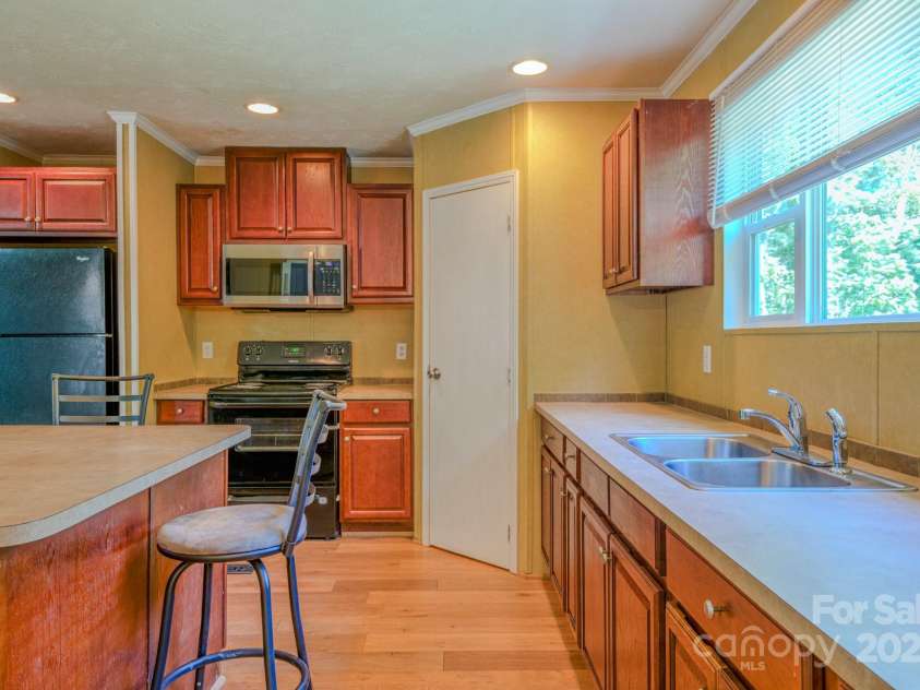 4065 NC 126 Highway, Morganton, NC 28655.  MLS# CAR4260543, YatesRealty ID 16890. 