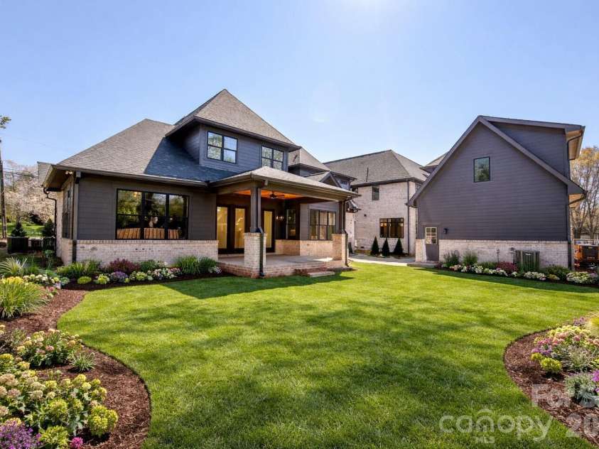 4822 Walker Road, Charlotte, NC 28211.  MLS# CAR4360360, YatesRealty ID 16890. Backyard - - - Rendered Using AI