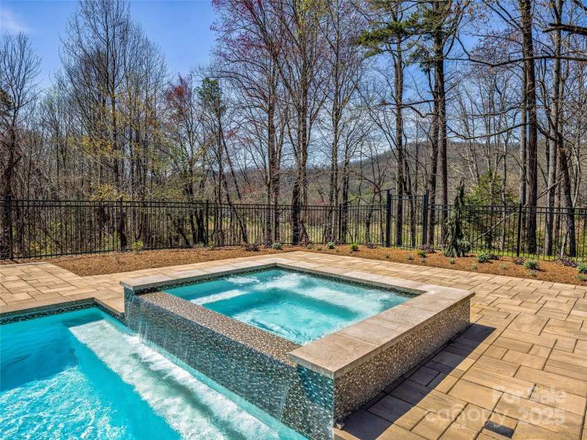 59 Bradford Hill Road, Mills River, NC 28759.  MLS# CAR4241459, YatesRealty ID 16892. 6-person hot-tub w/ waterfall feature!