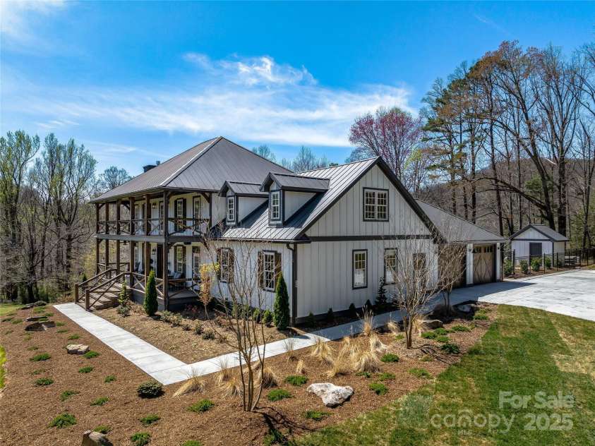 59 Bradford Hill Road, Mills River, NC 28759.  MLS# CAR4241459, YatesRealty ID 16892. Beautifully landscaped yard!
