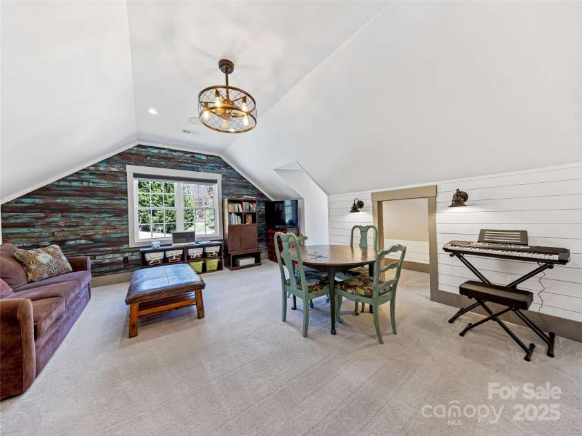 59 Bradford Hill Road, Mills River, NC 28759.  MLS# CAR4241459, YatesRealty ID 16892. Bonus room over the garage w/ walk-in attic access