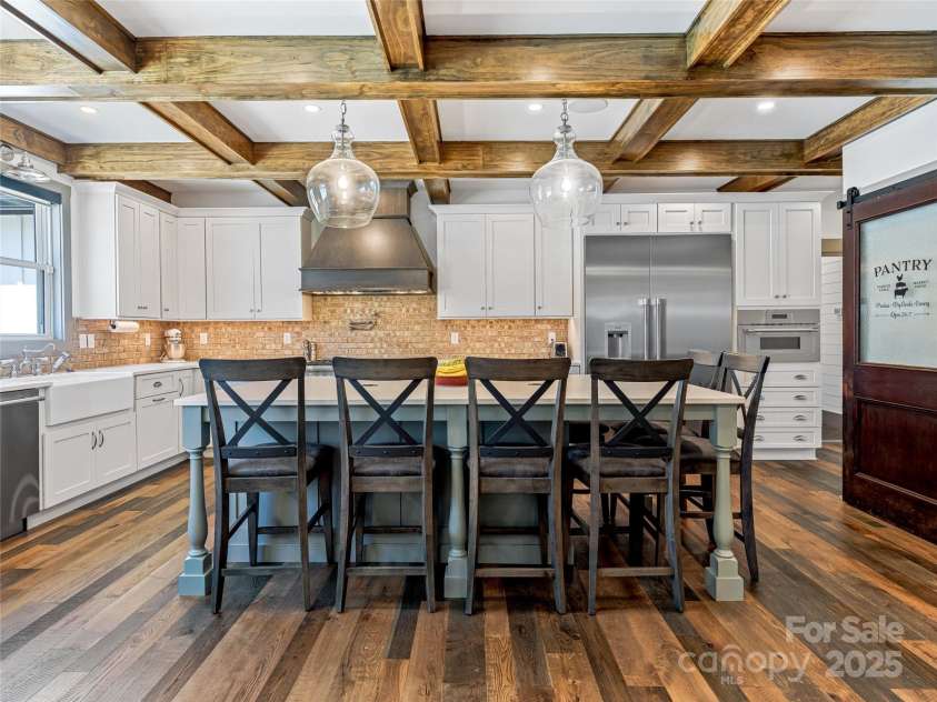 59 Bradford Hill Road, Mills River, NC 28759.  MLS# CAR4241459, YatesRealty ID 16892. Fabulous functional kitchen island and breakfast bar
