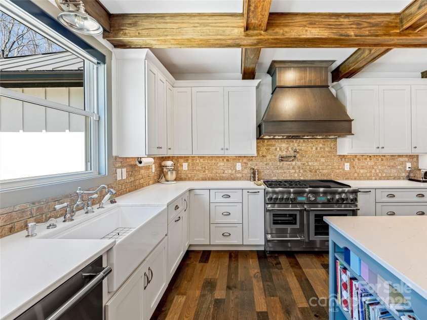 59 Bradford Hill Road, Mills River, NC 28759.  MLS# CAR4241459, YatesRealty ID 16892. Farmhouse sink and top-rated appliances!