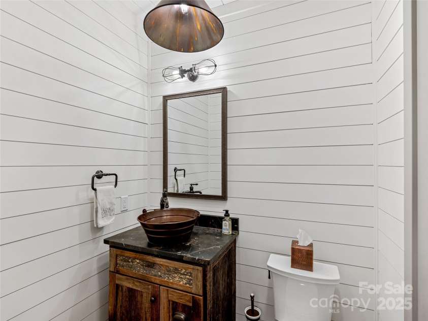 59 Bradford Hill Road, Mills River, NC 28759.  MLS# CAR4241459, YatesRealty ID 16892. Half bath on main