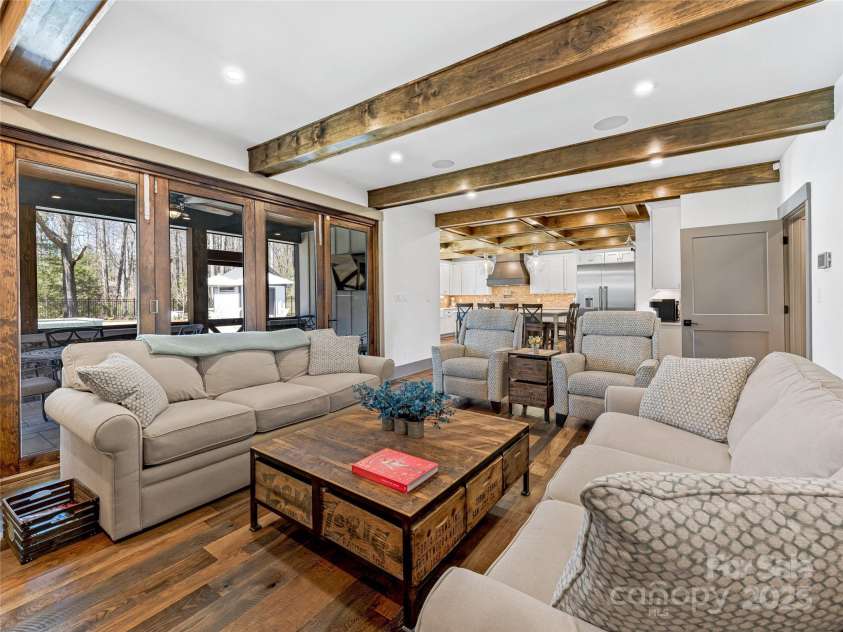 59 Bradford Hill Road, Mills River, NC 28759.  MLS# CAR4241459, YatesRealty ID 16892. Inviting open floor plan to luxurious kitchen!