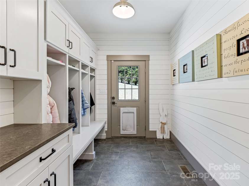 59 Bradford Hill Road, Mills River, NC 28759.  MLS# CAR4241459, YatesRealty ID 16892. Mud room w/ well organized drop zone