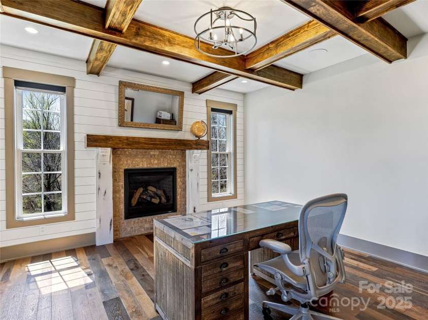59 Bradford Hill Road, Mills River, NC 28759.  MLS# CAR4241459, YatesRealty ID 16892. Office on main level w/ gas logs fireplace and access to front porch
