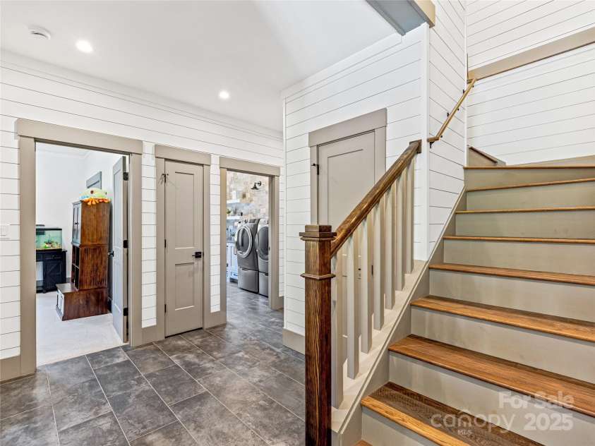 59 Bradford Hill Road, Mills River, NC 28759.  MLS# CAR4241459, YatesRealty ID 16892. One of 2 staircases leading to upper level