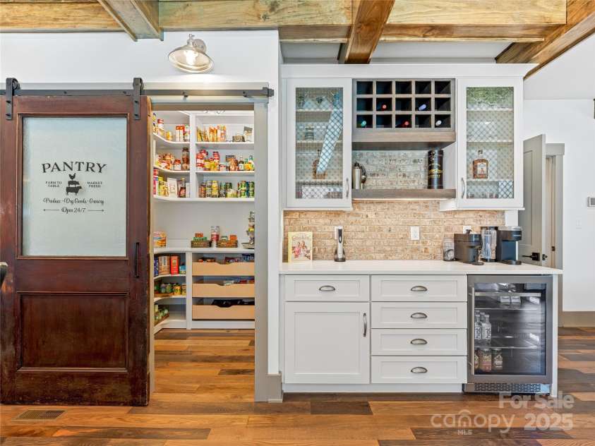 59 Bradford Hill Road, Mills River, NC 28759.  MLS# CAR4241459, YatesRealty ID 16892. Pantry barn door adds the perfect touch!