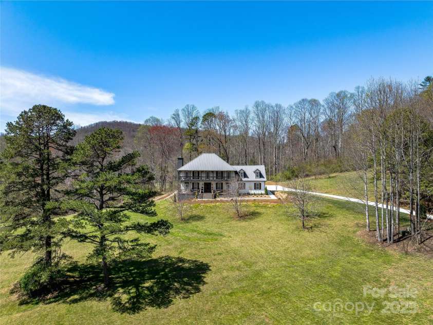 59 Bradford Hill Road, Mills River, NC 28759.  MLS# CAR4241459, YatesRealty ID 16892. Spacious yard creates both privacy and serenity