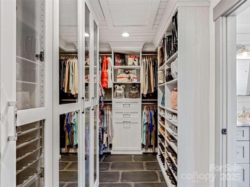 59 Bradford Hill Road, Mills River, NC 28759.  MLS# CAR4241459, YatesRealty ID 16892. Spectacular primary walk-in closet