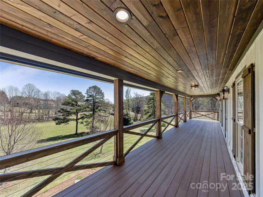 59 Bradford Hill Road, Mills River, NC 28759.  MLS# CAR4241459, YatesRealty ID 16892. View from upper level porch