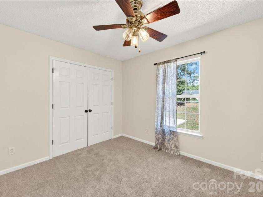 3002 Plyler Mill Road, Monroe, NC 28112.  MLS# CAR4330579, YatesRealty ID 16894. Bedroom