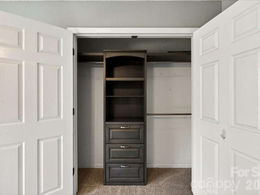 3002 Plyler Mill Road, Monroe, NC 28112.  MLS# CAR4330579, YatesRealty ID 16894. Closet system in primary bedroom