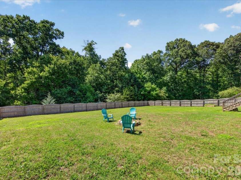 3002 Plyler Mill Road, Monroe, NC 28112.  MLS# CAR4330579, YatesRealty ID 16894. Firepit