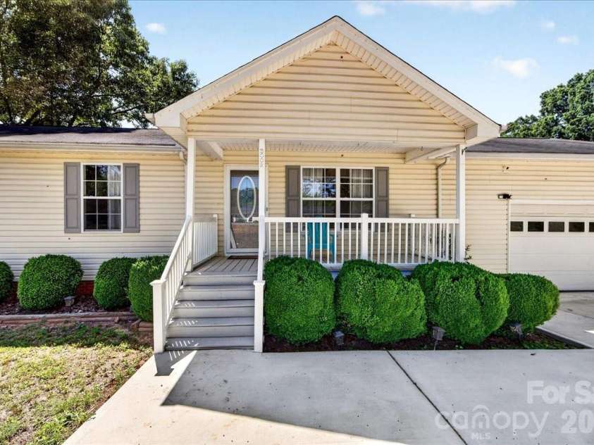3002 Plyler Mill Road, Monroe, NC 28112.  MLS# CAR4330579, YatesRealty ID 16894. Front porch living