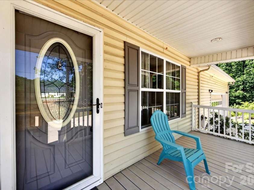 3002 Plyler Mill Road, Monroe, NC 28112.  MLS# CAR4330579, YatesRealty ID 16894. Front porch living