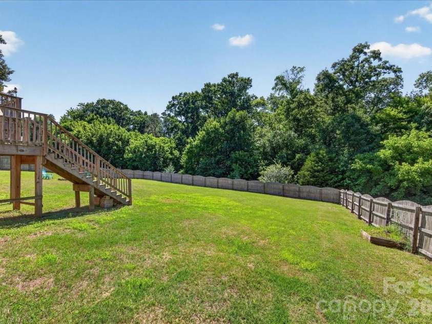 3002 Plyler Mill Road, Monroe, NC 28112.  MLS# CAR4330579, YatesRealty ID 16894. Huge fenced in backyard