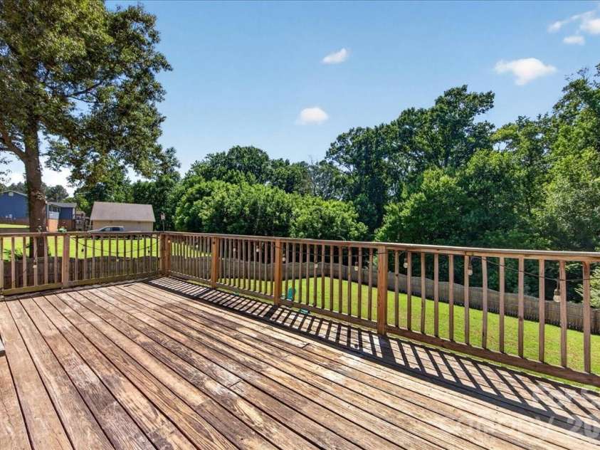 3002 Plyler Mill Road, Monroe, NC 28112.  MLS# CAR4330579, YatesRealty ID 16894. Large deck