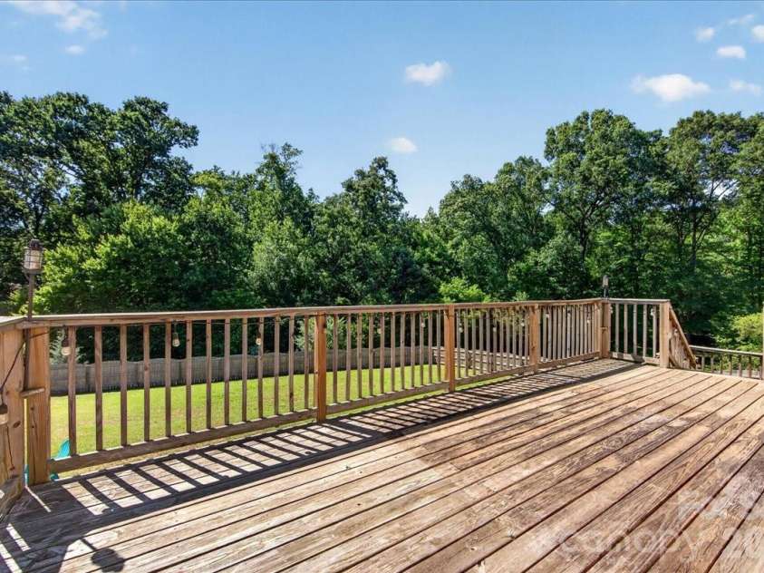 3002 Plyler Mill Road, Monroe, NC 28112.  MLS# CAR4330579, YatesRealty ID 16894. Large deck