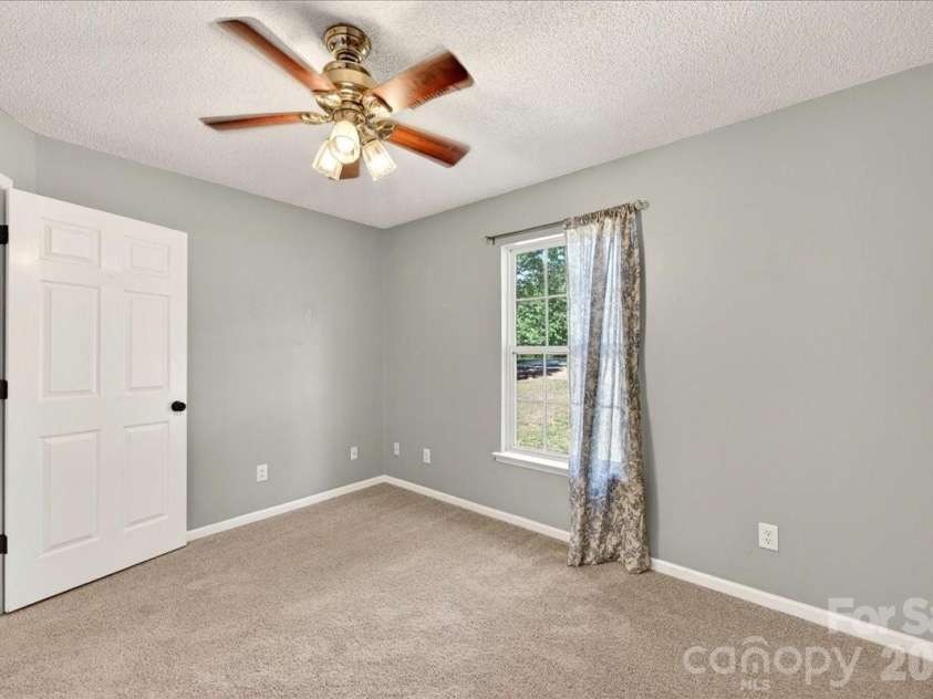 3002 Plyler Mill Road, Monroe, NC 28112.  MLS# CAR4330579, YatesRealty ID 16894. Office/bedroom