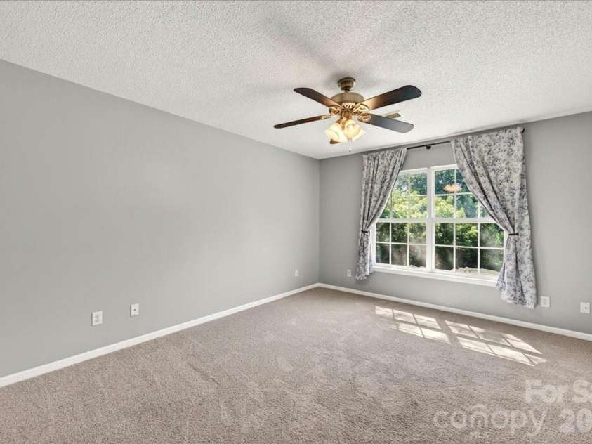 3002 Plyler Mill Road, Monroe, NC 28112.  MLS# CAR4330579, YatesRealty ID 16894. Primary bedroom