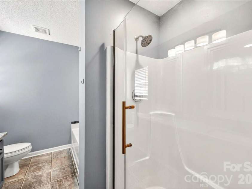 3002 Plyler Mill Road, Monroe, NC 28112.  MLS# CAR4330579, YatesRealty ID 16894. Primary en suite