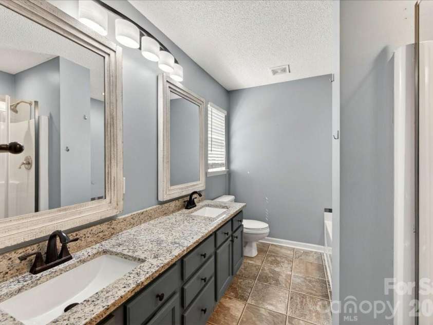 3002 Plyler Mill Road, Monroe, NC 28112.  MLS# CAR4330579, YatesRealty ID 16894. Primary en suite with double vanity